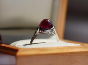 An Early 20th Century Sugarloaf Cabochon Burma (Myanmar) No Heat Ruby and Diamond Ring